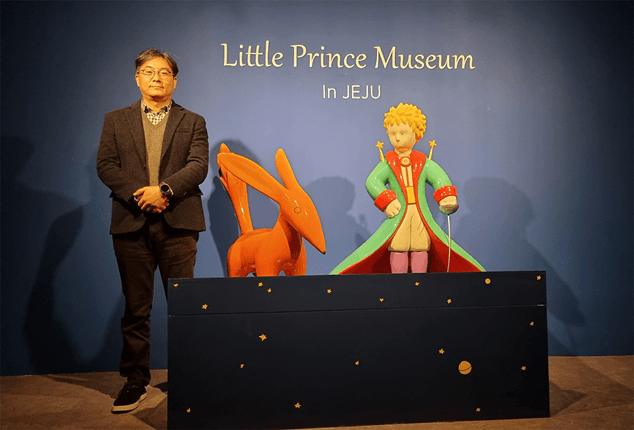Statues of the Little Prince and the fox at the Little Prince Museum in Jeju, showcasing a cultural adaptation inspired by the famous book.