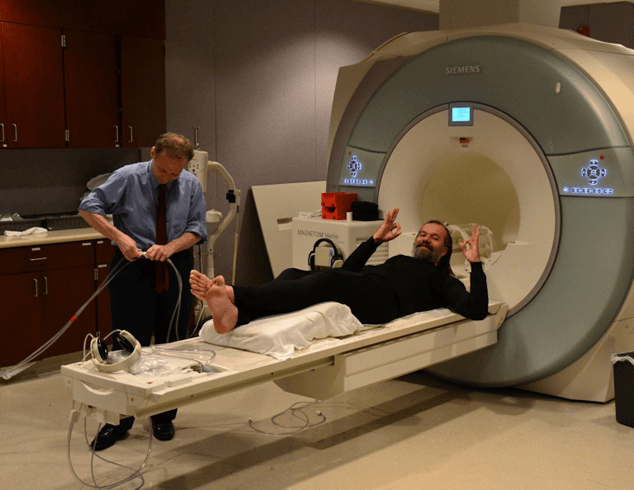 Wim Hof undergoing an MRI brain scan in a scientific research study showing brain activity changes