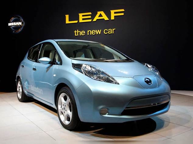 Nissan Leaf, the pioneering mass market electric vehicle launched around 2010, emphasizing zero emissions.